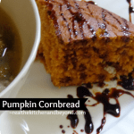 Celebrate autumn flavors with this deliciously moist pumpkin cornbread. A perfect complement to a hearty soup or stew #menuplanning #fallrecipes #pumpkin ~ realthekitchenandbeyond.com