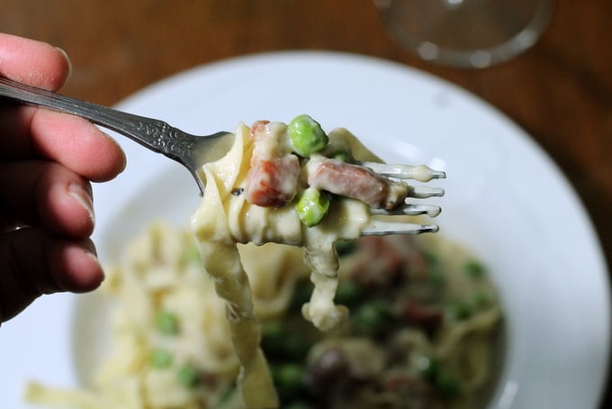 Fork of Pasta with Peas and Prosciutto White Sauce