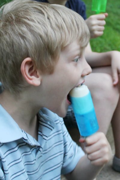 kid attacking key lime popsicle