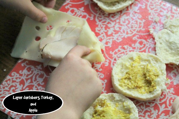 Jarlsberg Turkey Apple Melts Step 3 - layer the ingredients on the pita