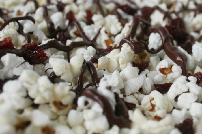 Easy Popcorn Recipes: Chocolate Cherry Popcorn uses just 3 ingredients and is a quick and easy treat to make for Valentine's Day or any day. Best of all it's nut-free and gluten-free. | www.realthekitchenandbeyond.com