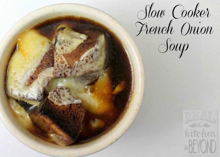 Easy to make at home, Slow Cooker French Onion Soup doesn't have to be reserved for dinner out anymore.| www.realthekitchenandbeyond.com