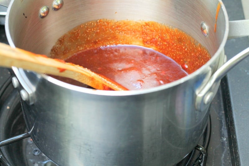 Sweet and Spicy Chipotle BBQ Sauce with La Morena Chipotle Peppers in pan